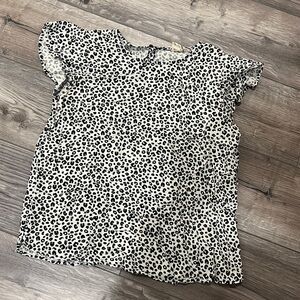 Size small black & white cheetah print boutique top with ruffle sleeves
